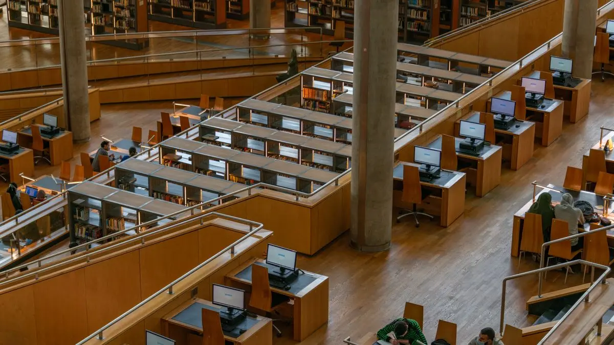 Reading desks and bookshelves inside Bibliotheca Alexandrina.