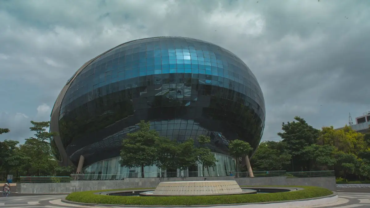 Rounded glass building in Pimpri-Chinchwad, India.