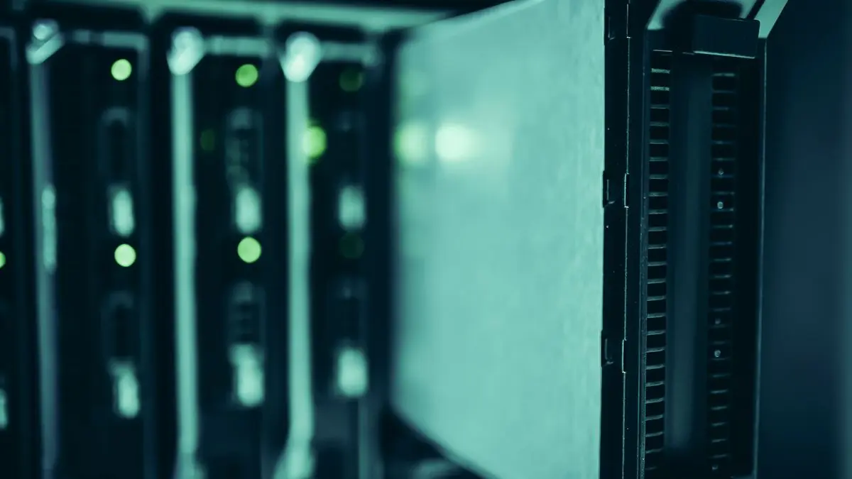 Server racks with green indicator lights.